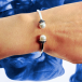 White gold bangle with pearls and sapphires
