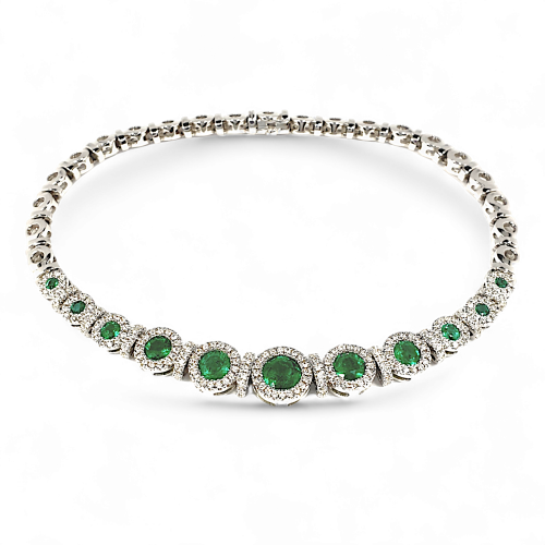 White gold bracelet with emeralds and diamonds