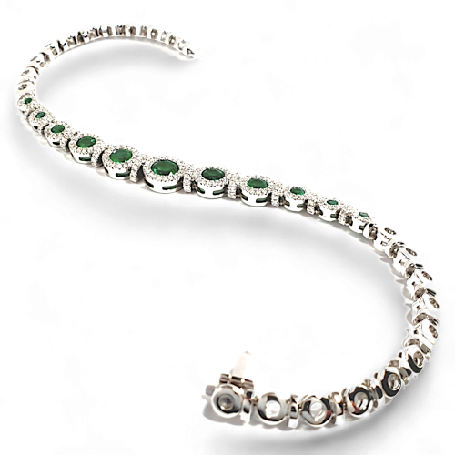 White gold bracelet with emeralds and diamonds