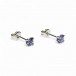 White gold earring with tanzanite